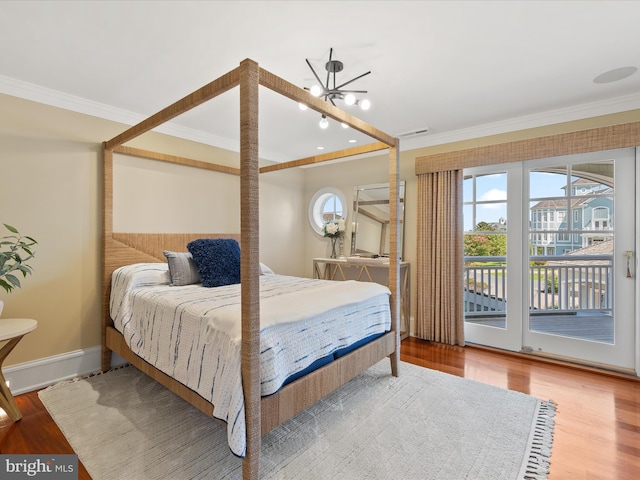 9601 Ocean Vw, Ocean City, MD 21842 - bedroom featuring crown molding, access to outside, and multiple windows