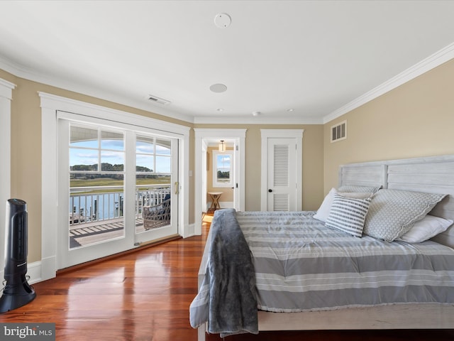 9601 Ocean Vw, Ocean City, MD 21842 - bedroom featuring access to exterior, wood finished floors, visible vents, and ornamental molding