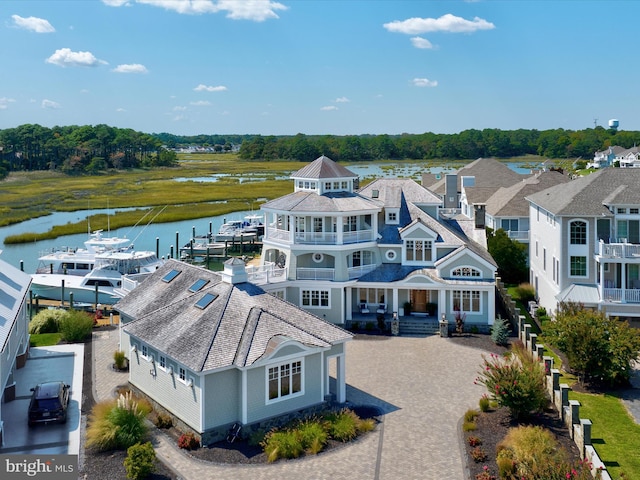 drone / aerial view with a water view