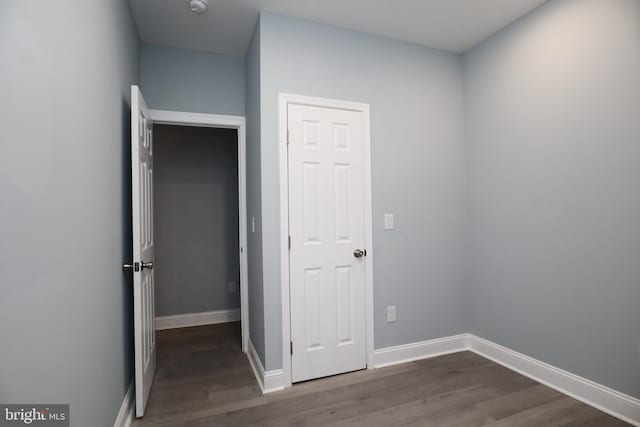 interior space featuring dark wood-type flooring