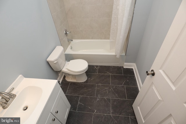 full bathroom with vanity, toilet, and shower / tub combo with curtain