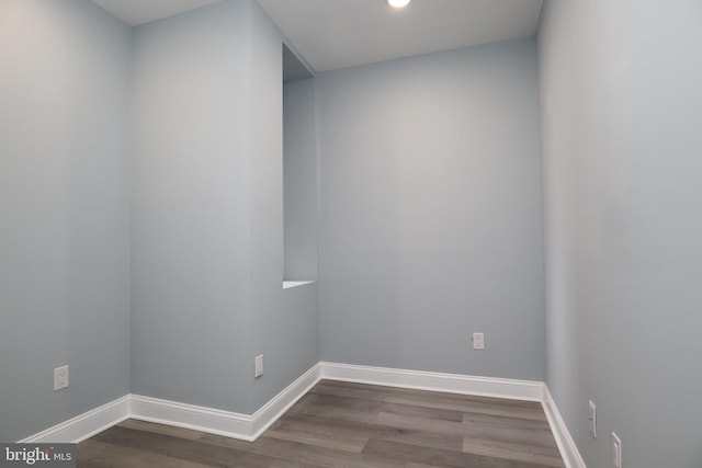 spare room with hardwood / wood-style flooring