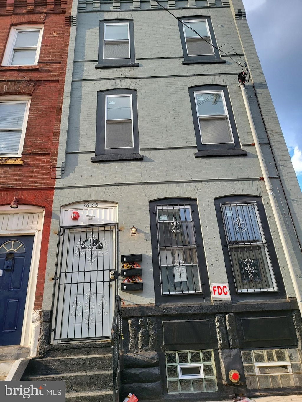 multi unit property featuring brick siding