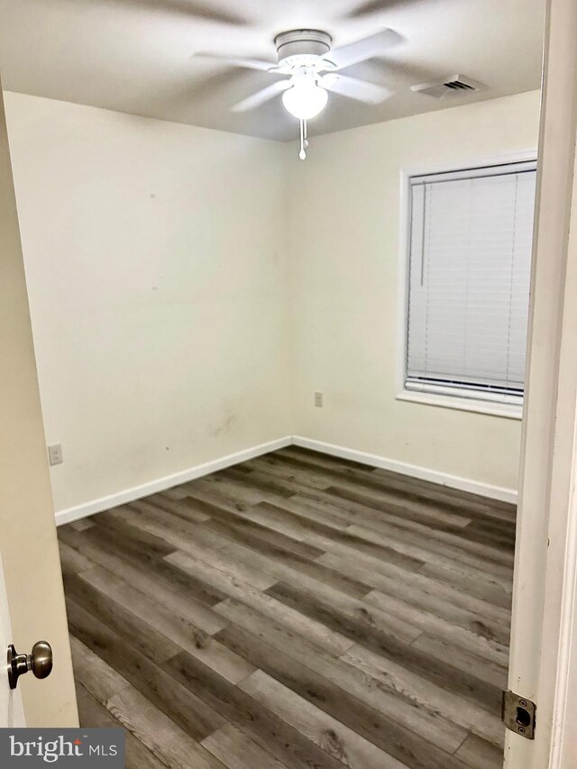 5601 Briarwood Dr, Millville, NJ 08332 - spare room with ceiling fan, dark wood-style floors, and baseboards