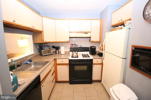 kitchen featuring sink, white cabinetry, decorative backsplash, black appliances, and light tile patterned floors