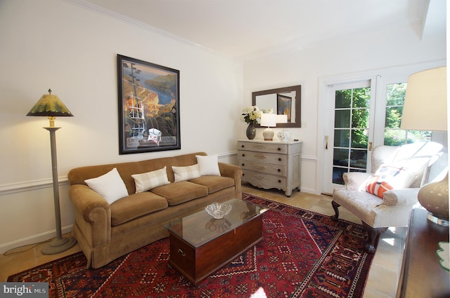 tiled living room featuring ornamental molding