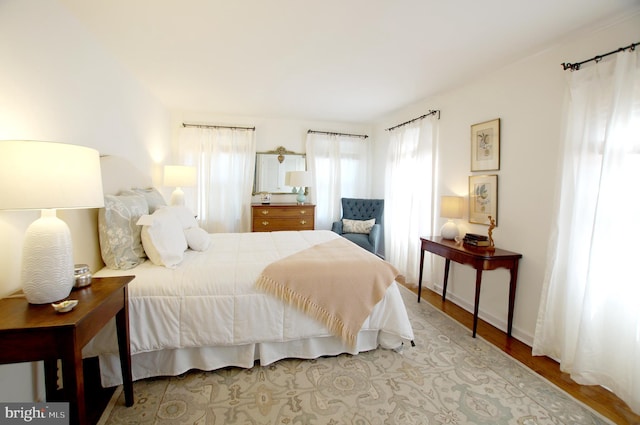 bedroom featuring light hardwood / wood-style floors