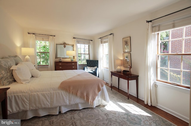 bedroom featuring hardwood / wood-style floors