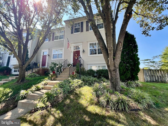 view of front of house with a front lawn