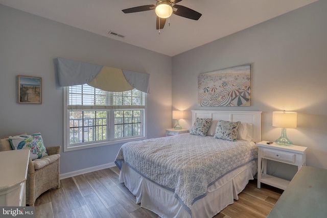 bedroom featuring ceiling fan and light wood-type flooring