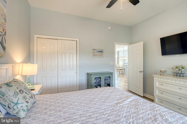 bedroom featuring a closet, ceiling fan, and hardwood / wood-style floors