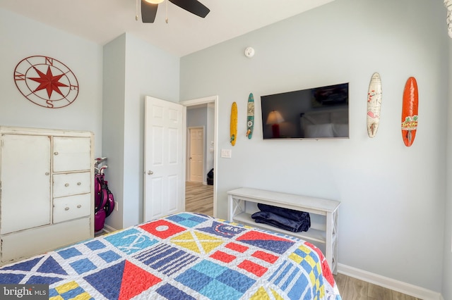 bedroom featuring light hardwood / wood-style flooring and ceiling fan