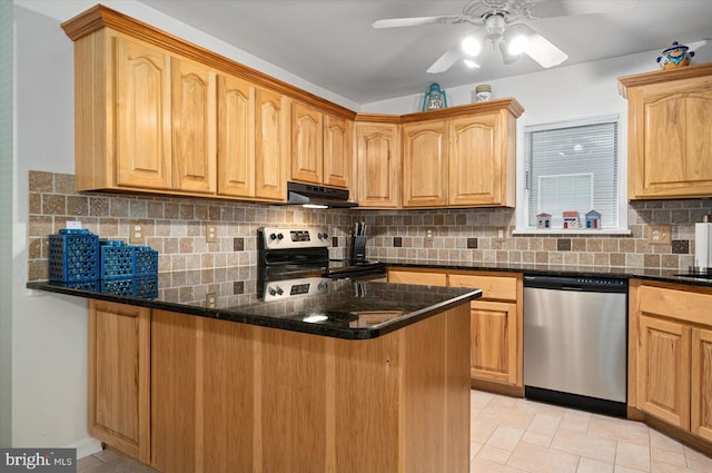 kitchen with a ceiling fan, a peninsula, under cabinet range hood, appliances with stainless steel finishes, and backsplash