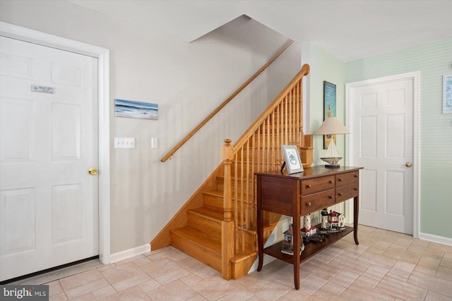 staircase with baseboards