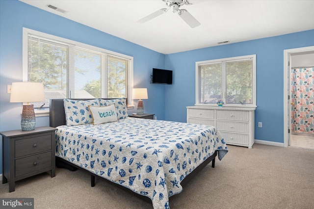 bedroom featuring a ceiling fan, carpet, visible vents, and baseboards