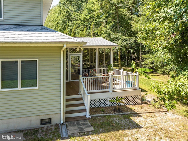 deck with a sunroom