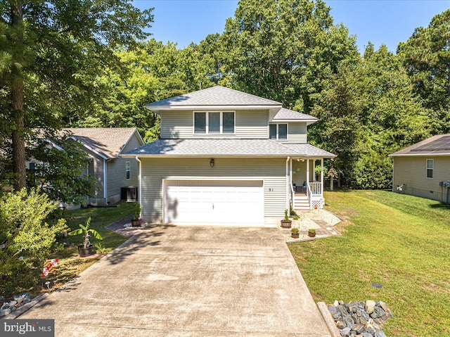 view of front of house featuring a garage, roof with shingles, concrete driveway, and a front yard