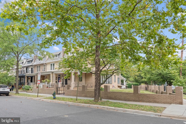 view of front of property featuring covered porch