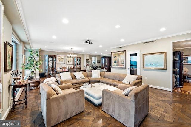 living room featuring a notable chandelier, crown molding, and dark parquet floors