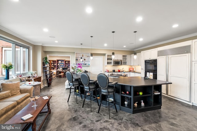 kitchen with open shelves, stainless steel microwave, paneled built in fridge, dark countertops, and white cabinets