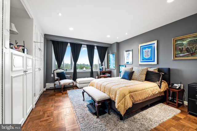 bedroom with dark parquet flooring