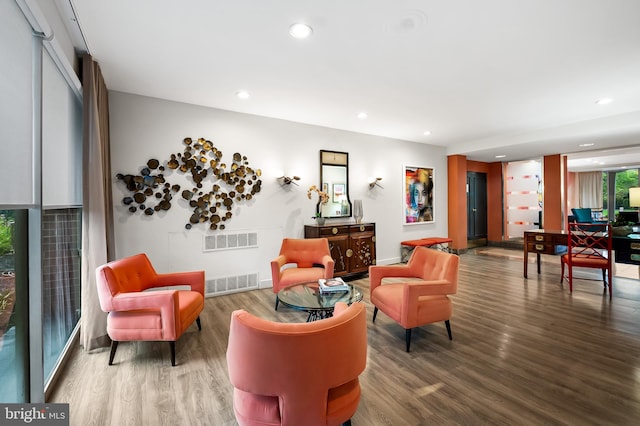 interior space featuring hardwood / wood-style flooring and radiator heating unit