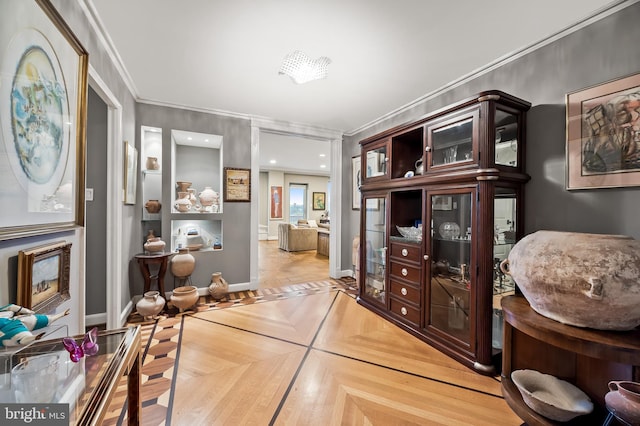 dining room featuring baseboards and ornamental molding