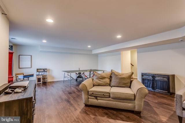 living room with dark hardwood / wood-style floors