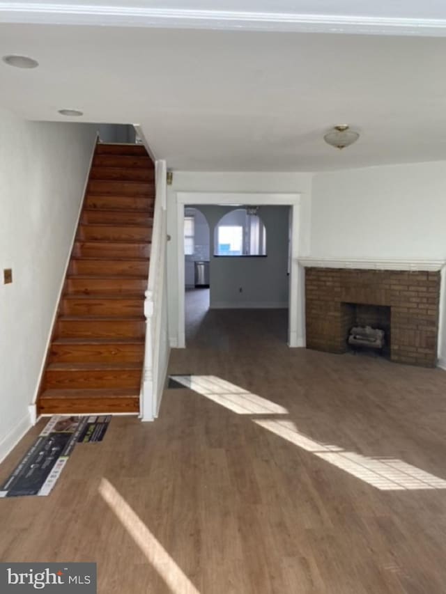 unfurnished living room with a fireplace