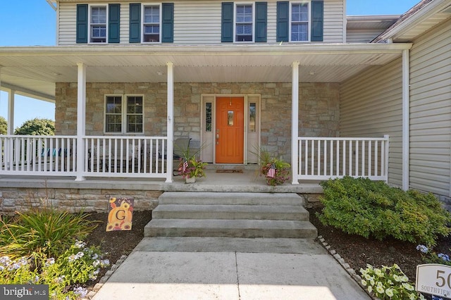 entrance to property with covered porch