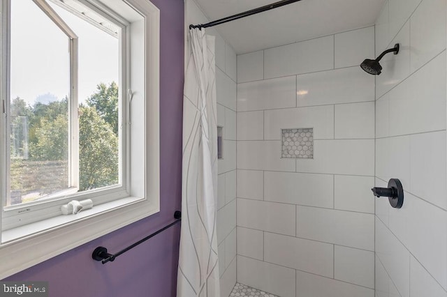 bathroom featuring walk in shower