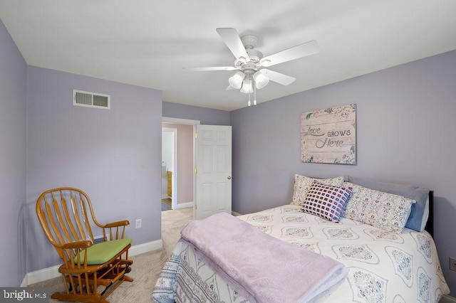 bedroom featuring ceiling fan and light carpet