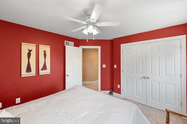 bedroom with light carpet and ceiling fan