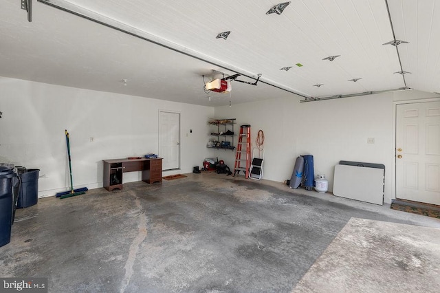 garage featuring a garage door opener