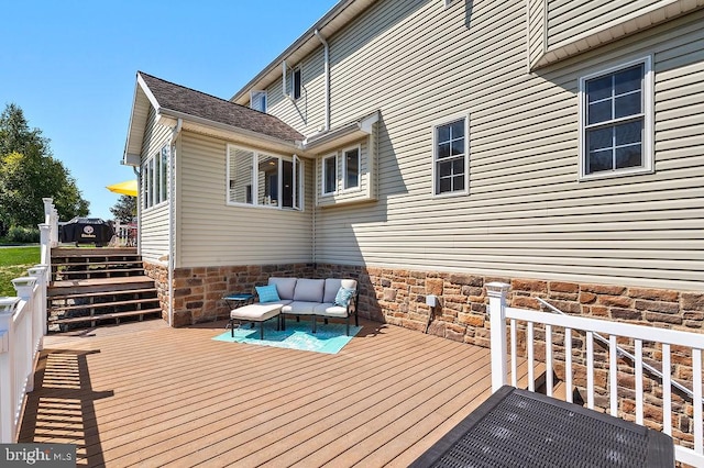 deck with an outdoor hangout area