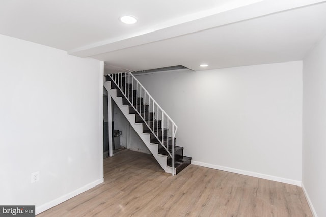 basement featuring light wood-type flooring