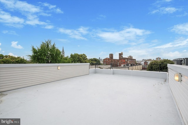 view of patio featuring a balcony