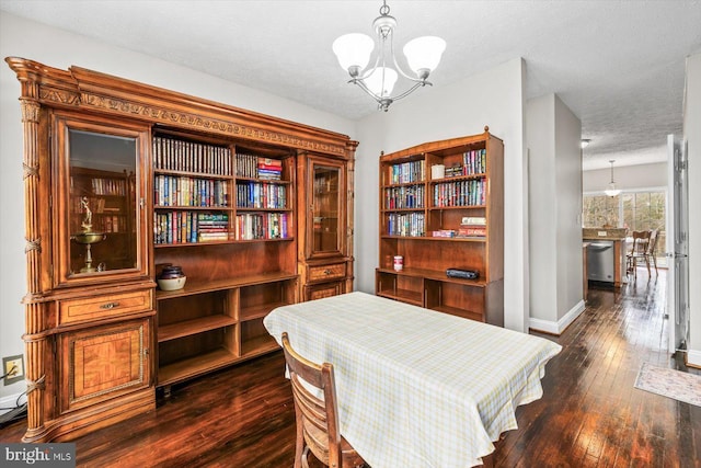 6330 Kleineidam Way, Spotsylvania, VA 22551 - home office with a textured ceiling, a notable chandelier, dark wood-type flooring, and baseboards