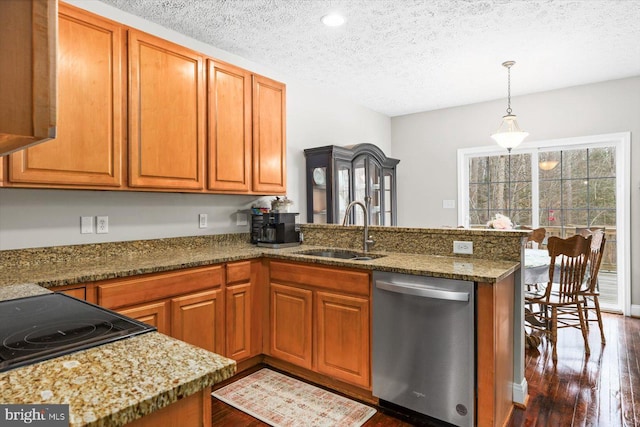 6330 Kleineidam Way, Spotsylvania, VA 22551 - kitchen featuring a sink, a peninsula, brown cabinets, and dishwasher
