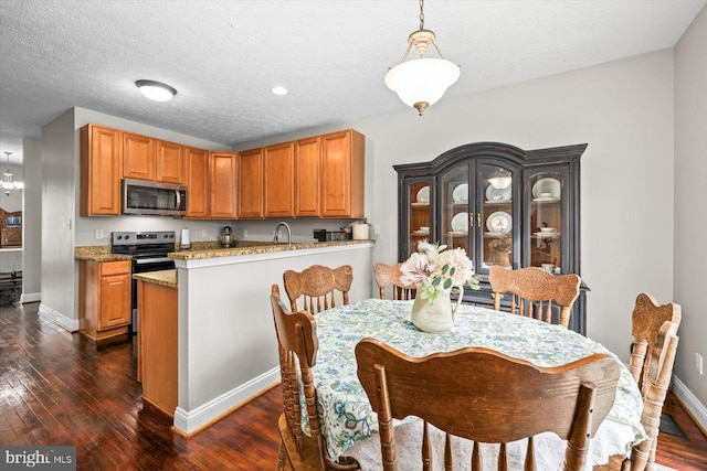 6330 Kleineidam Way, Spotsylvania, VA 22551 - dining area featuring baseboards and dark wood-style floors