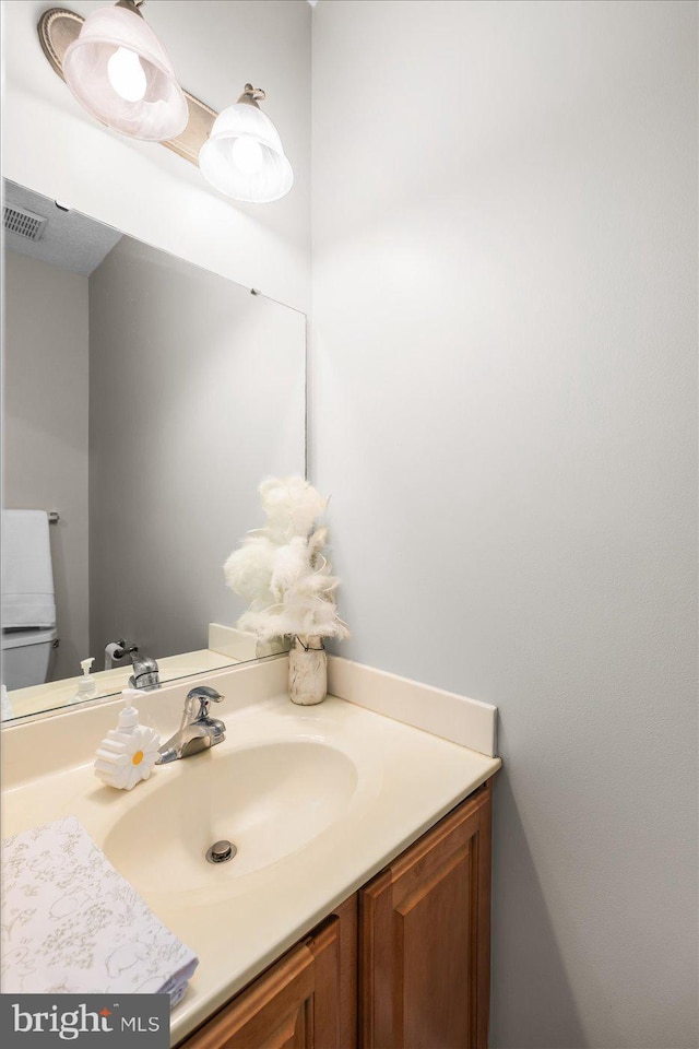 6330 Kleineidam Way, Spotsylvania, VA 22551 - half bath featuring toilet, vanity, and visible vents