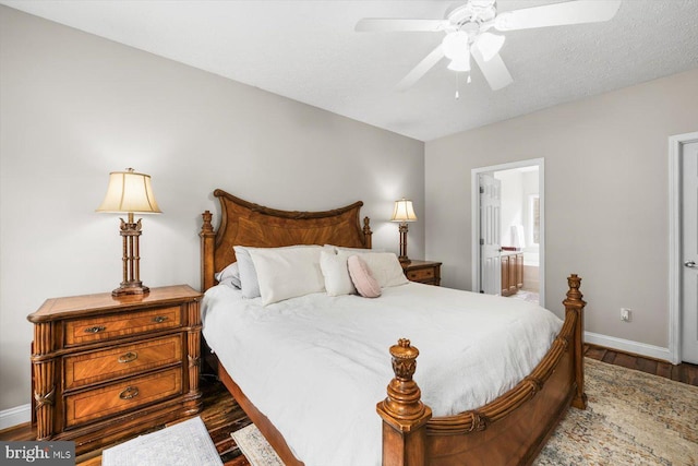 6330 Kleineidam Way, Spotsylvania, VA 22551 - bedroom featuring baseboards, ensuite bath, ceiling fan, and wood finished floors