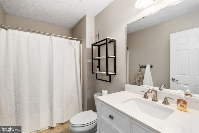6330 Kleineidam Way, Spotsylvania, VA 22551 - bathroom featuring vanity, toilet, and a textured ceiling