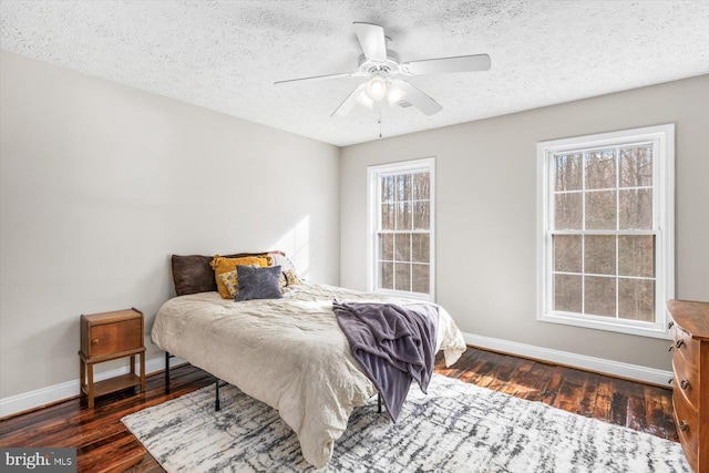 6330 Kleineidam Way, Spotsylvania, VA 22551 - bedroom featuring wood finished floors, baseboards, and a textured ceiling