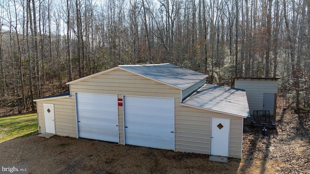6330 Kleineidam Way, Spotsylvania, VA 22551 - detached garage featuring a view of trees