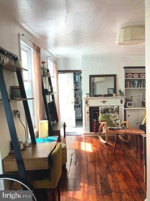 living room with wood-type flooring