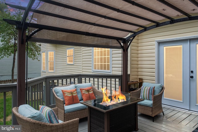 wooden deck with a pergola and an outdoor living space with a fire pit