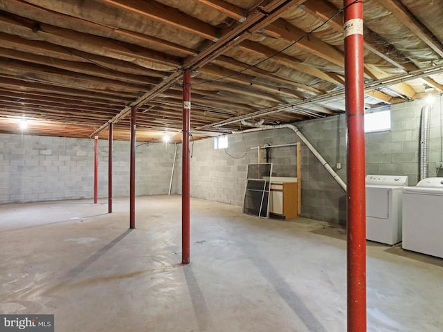 basement featuring washer and dryer