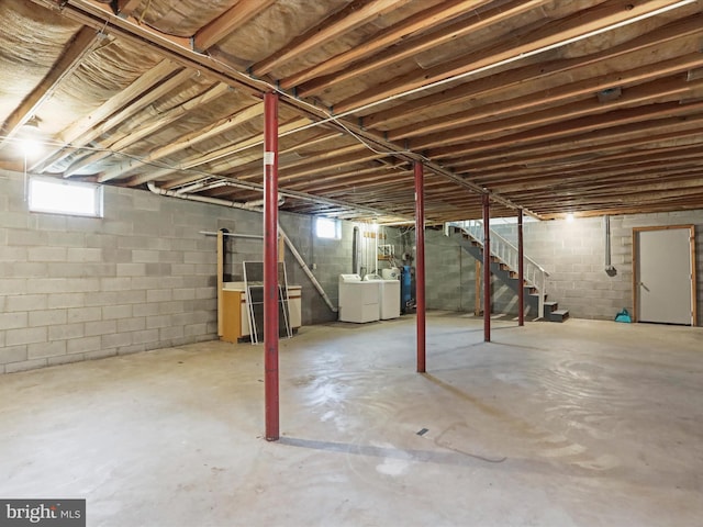 basement featuring washing machine and dryer