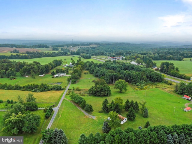 birds eye view of property featuring a rural view